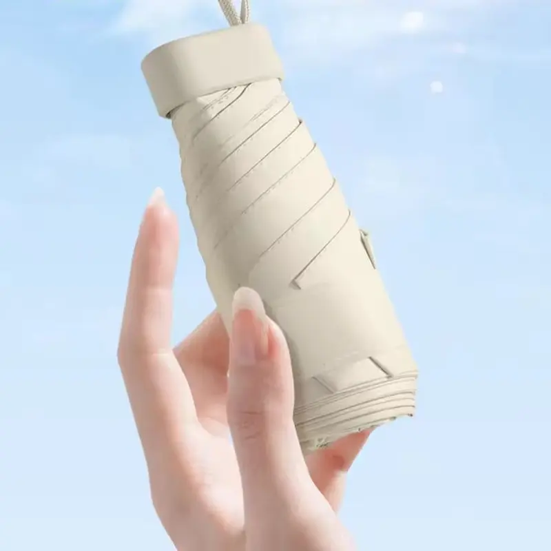 Super Mini Portable Foldable Umbrella with UV Protection Capsule Case, Lightweight Waterproof Umbrella, Easy to Carry Windproof Pocket Umbrella for School & Travel, Easy to Carry, Ideal Home Accessory