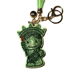 Green Lady Liberty Bag Charm or Keychain with Sparkling Rhinestones and Tassel Accents for Stylish Accessories
