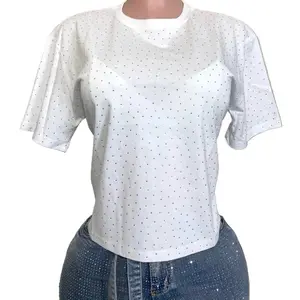 Addyson Top - White rhinestone t shirt top  65% cotton  35% Polyester White Rhinestone: The top features white rhinestones, adding a sparkling accent.Versatile Material: The combination of cotton and polyester offers both comfort and durability.