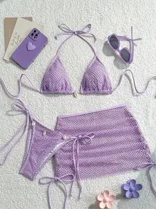 Ladies' three-piece vacation bikini set, Halter Neck Bikini, Halter Bathing Suit, featuring a fishnet halter top with ties at the back and a matching swim bottom, covered by a transparent mesh skirt, beach vacations, Swimsuit Set, Swimsuit For Beach