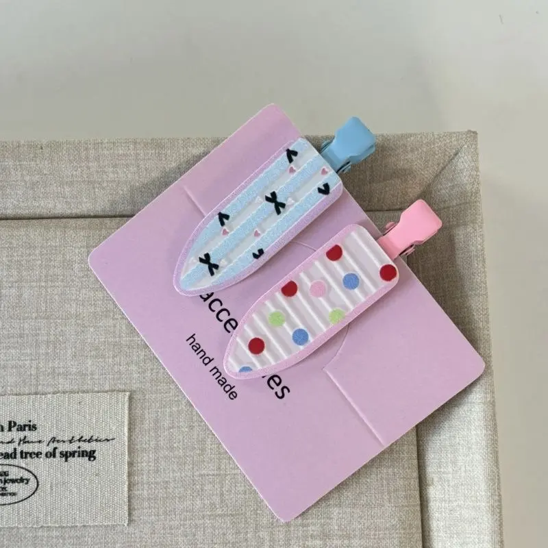 Blue striped and colorful polka dot hair clip set