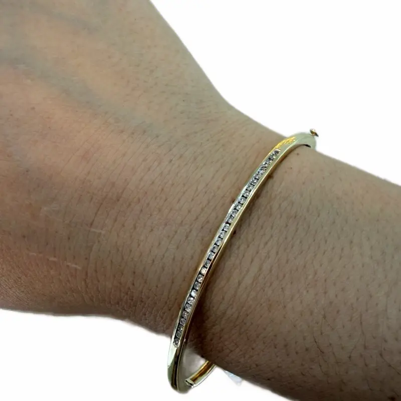 14K Gold Bangle with Unique Design and Elegant Shine for Everyday Wear