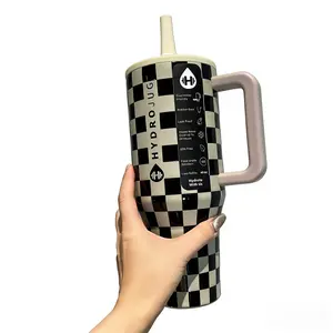 The Hydrojug grid pattern features a classic black and white grid design. This is an original travel-sized 40-ounce double-layer stainless steel flip-top stainless steel water bottle with a leak-proof design and rubber base.