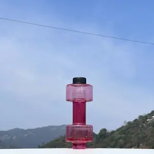 Creative dumbbell water cup, a high-value sports cup that integrates arm muscles and drinking water functions; large-capacity leak-proof design, suitable for portable plastic water cups carried during outdoor running and fitness (not hot water)