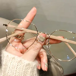 One pair of women's elegant round-frame glasses - gold and off-white metal, full-rim design, a trendy and fashionable accessory perfect for everyday commuting / the best gift idea for friends Vintage Square Transparent Gray Sunglasses Minimalist Oval Set