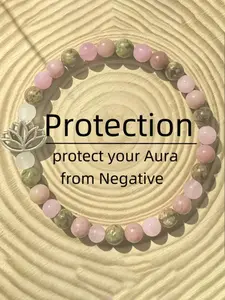 6mm Lotus Chakra Bracelet With Rose Quartz, Rhodonite, And Unakite - Natural Gemstone Beads Symbolize Prosperity And Love. This Elegant Piece Is Perfect For Everyday Wear, A Bohemian-Inspired Spiritual Jewelry Piece, And A Gorgeous Crystal Gift For A Love