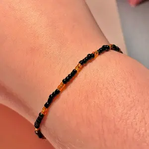Black and gold bracelet