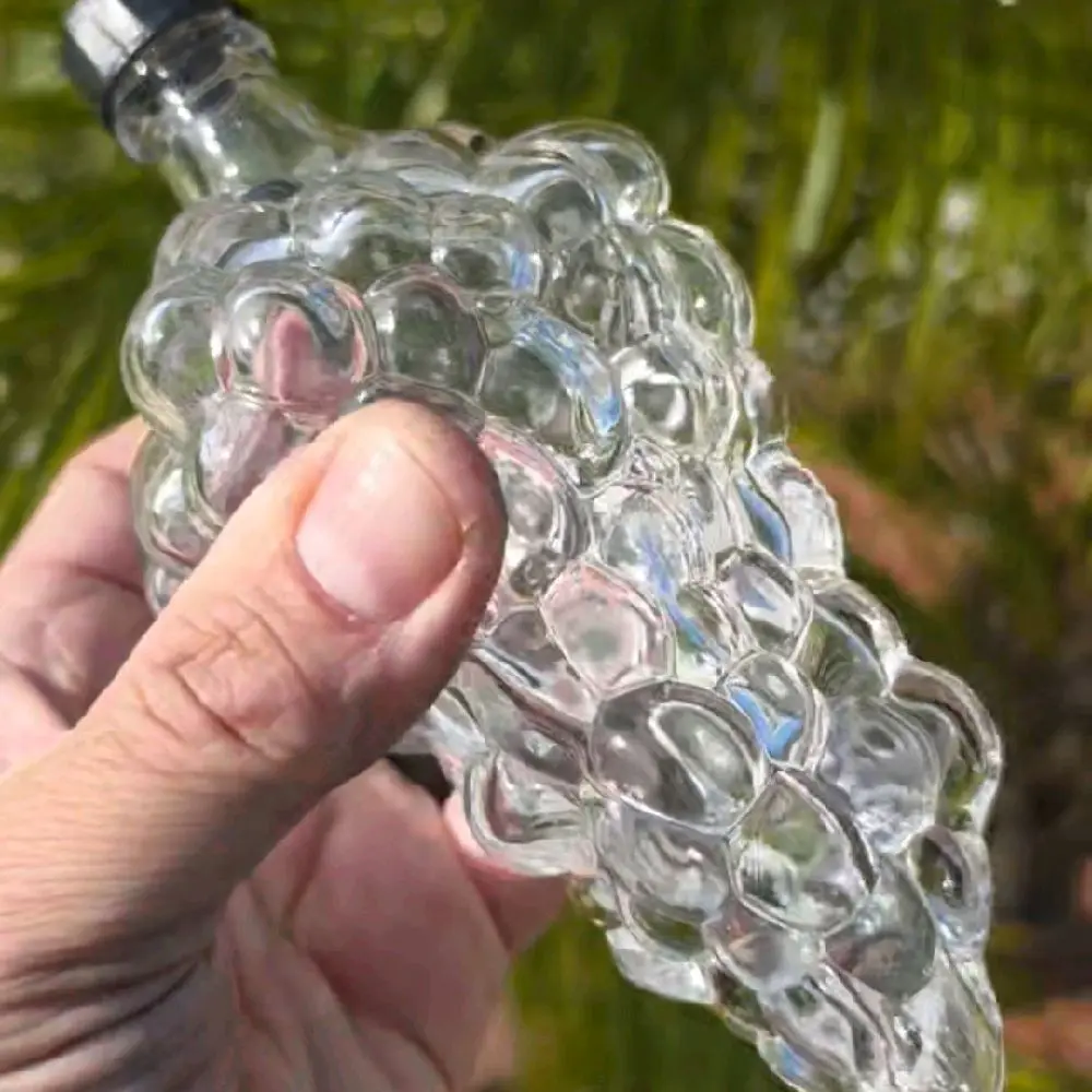 ​Vintage Clear Glass Grape Cluster Bottle – 365nm Manganese UV Glow