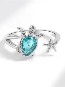 A Turtle and Star-shaped Ring Set with Blue Artificial Zirconia, Sparkling Zircon Inlay, Integrating Marine Element Design, Presents A Fresh and Vibrant Style, Suitable for Daily Wear and Party Occasions.
