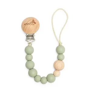 Ninni Co Olive Green Baby Pacifier Clip, BPA-Free Silicone Pacifier Holder with Wooden Clip