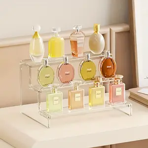 3-tier high transparent acrylic step display stand, featuring a 3-tier easy-to-install structure design, is sturdy and durable. It is suitable for perfumes, cosmetic bottles, jewelry collections, and can decorate dressers and modern desktop spaces.