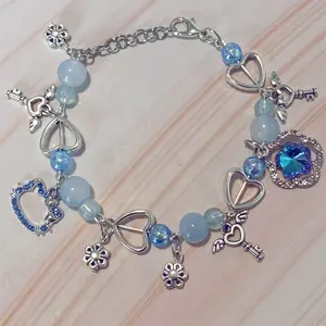 Blue y2k kitty charm bracelet, flower charms, heart charms, coquette jewelry