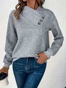 A women's light gray twill-textured asymmetrical buttoned half-high neck top, made of soft and textured fabric, with a loose and slimming fit and a touch of clever design. It is suitable for everyday wear in spring and autumn, commuting, casual shopping,