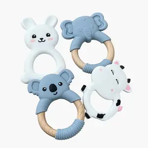 MomMed Silicone Baby Teething Toys for Babies 0-12 Months With Natural Beech Wood Handle, BPA Free Soft and Textured Ring Silicone Teether Relief Soothing Sore Gums Chew Infant Toys pacifier