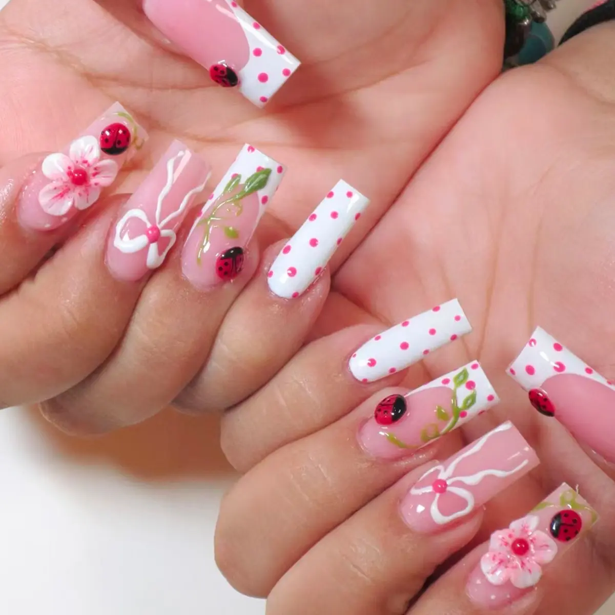 24pcs long square press on acrylic nail with 3D gelx nails five-petal flower design, red and white polka dot bow, french tip nails, ladybug embellishment, green leaves, suitable for dates fake nails, Decorative nails, DIY Nail Art, Nail Tips Art