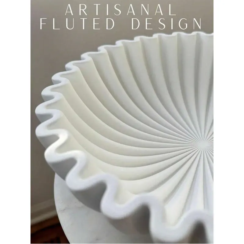 This modern, wavy-rimmed storage bowl, set in a stylish white dish, is perfect for storing keys, coins, or as a tabletop decoration, Modern Home Decor, Resin Ornament. It's ideal for both the entryway and living room. Ornaments
