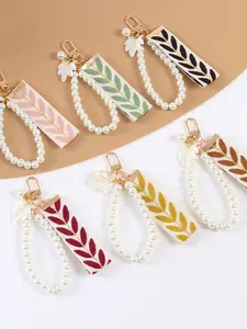 A fashionable and elegant pearl leaf striped ribbon bracelet keychain, accessory, suitable for daily outfit matching, and also a surprising exquisite small gift, Keychain For Bags