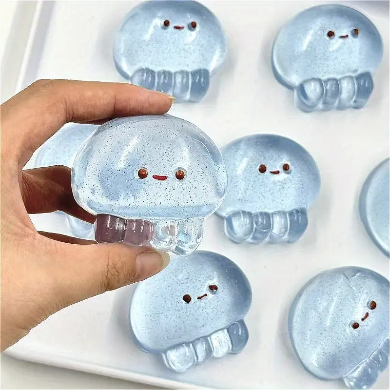 A transparent blue jellyfish squeeze toy, Taba jelly squeeze toy, Quick rebound feel, fun and novel pinching toy, holiday birthday gifts, Choose texture crack design, Ideal Gift for Thanksgiving