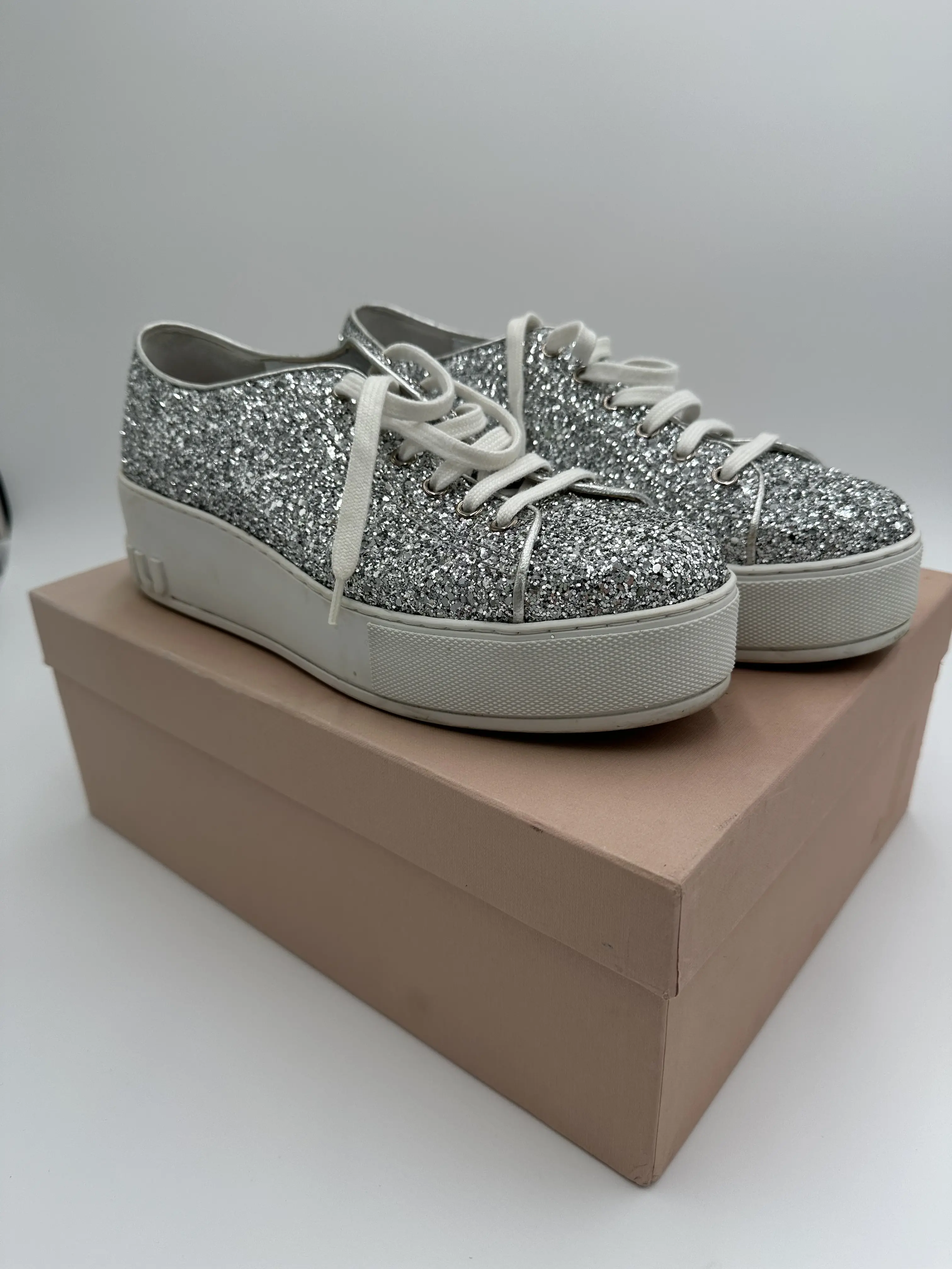 Pre-Owned Women's Miu Miu Metallic Silver Glitter Platform Sneakers - Chunky White Platform Soles, Embossed Logo Accent, Textured, Casual, Vintage, MSRP $590 to $690