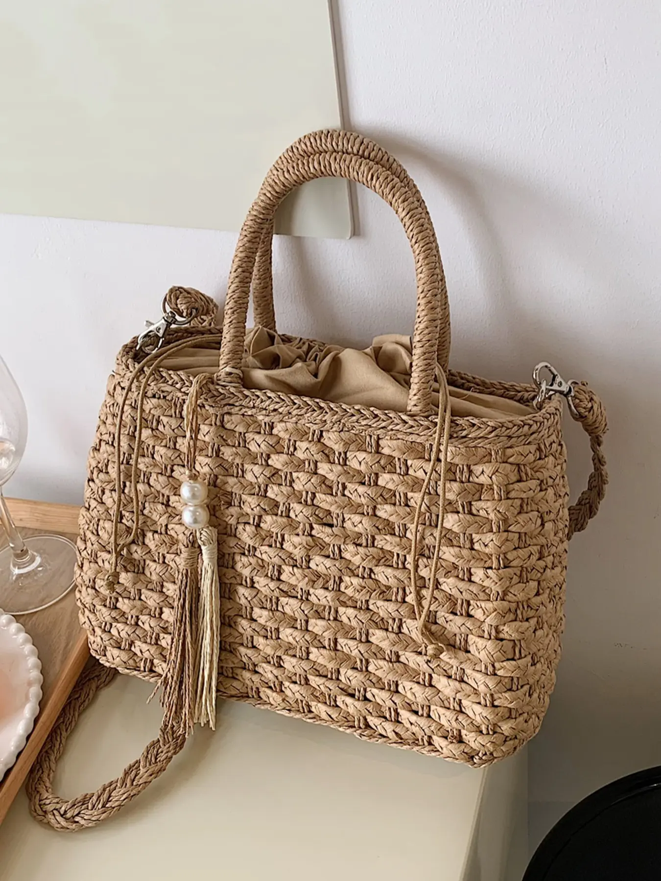 Artistic woven shoulder bag with exquisite drawstring inner pocket and pearl tassel hanging decoration, handheld design, large capacity to meet travel needs, suitable for commuting and shopping, Boho shoulder purses