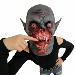 Bloodthirsty fanged vampire latex mask, gray-black gradient zombie skin, bloodshot and cloudy pupils, torn mouth with dense fangs and bloodstains. Suitable for Halloween haunted house vampire cosplay, role-playing horror prop. One size fits all adults.