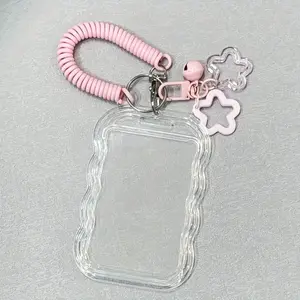 Set of 1 transparent ID Badge Holder keychain with cute star and bell charms; features a spring-loaded lanyard to prevent loss. Ideal as a gift for birthdays, graduations, or the start of the school year; perfect for office use, schools, and students.