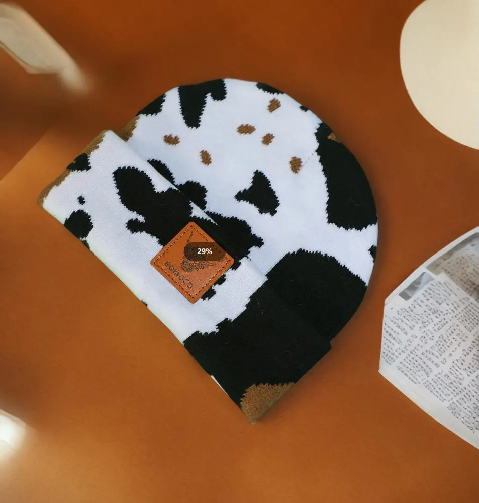 All black and white vintage fashion cow print knitted wool hat autumn and winter lovers all leopard print cold hat lady