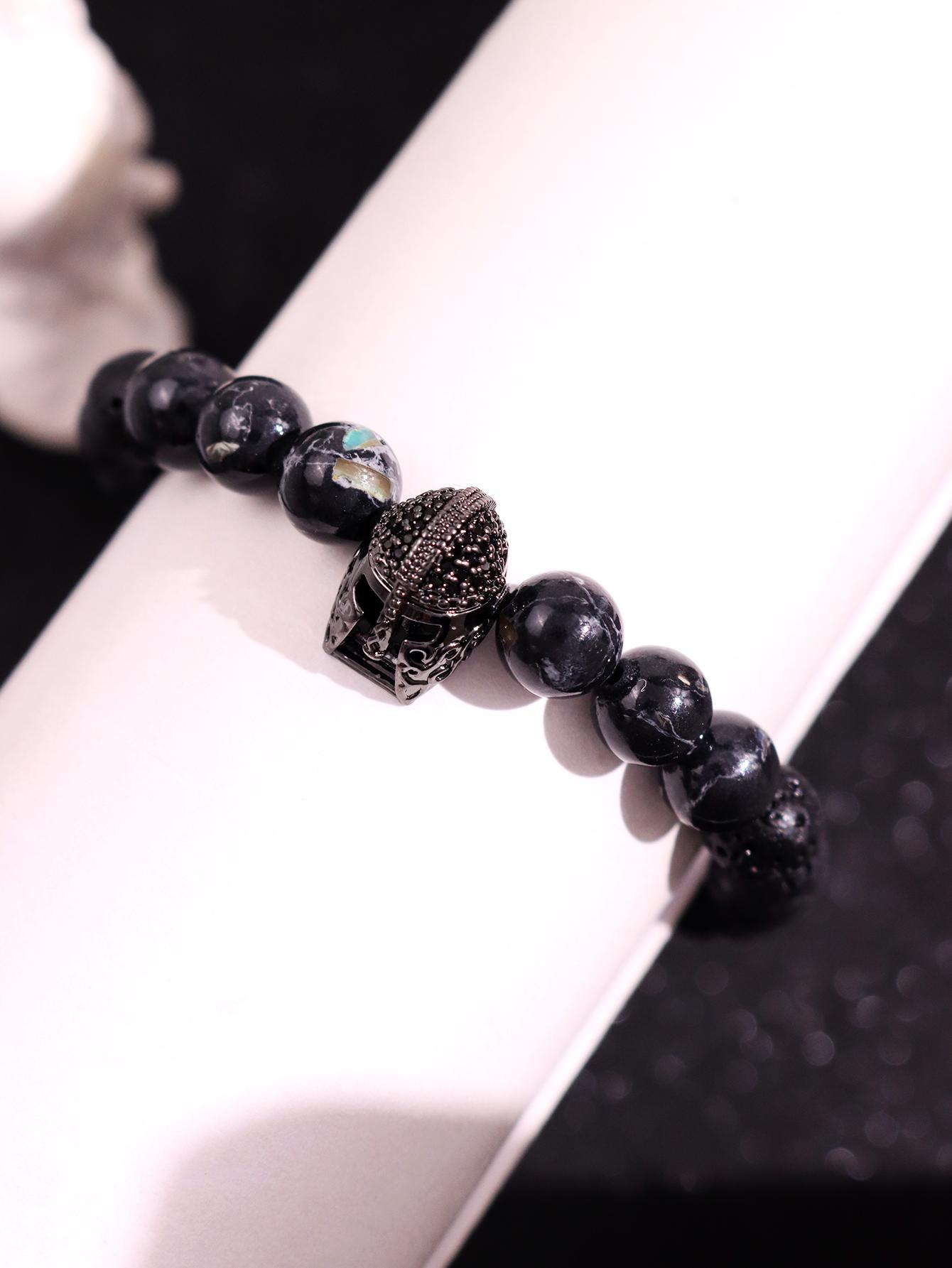 Pair of stylish, minimalist, luxurious, unique, cool, and refined bracelets featuring a Spartan helmet design and volcano stone beads for men—ideal for everyday wear, holidays, parties, and streetwear jewelry.