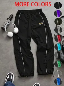 Men's Casual Sporty Loose Fit Long Pants with Elastic Cuffs, Fashion Letter Print Lightweight Fabric Pants for Daily Wear