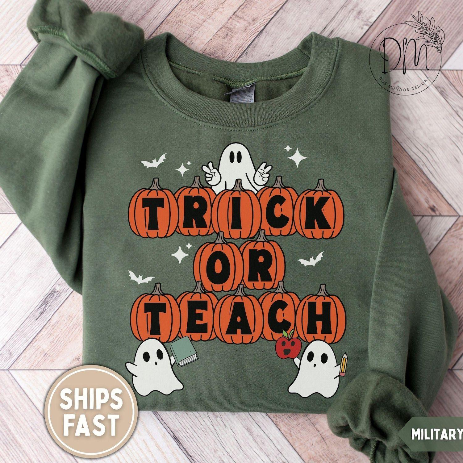 (Youth & Adult) Trick Or Teach Sweatshirt, Halloween Teacher Graphic, Spooky Pumpkin Crewneck, Unisex Educator Fall Pullover, Apparel Made In The USA , By Legacy Graphic