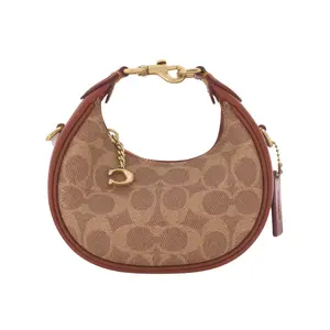 COACH Jonie 15 Top-Zip Crossbody Handbag for Women – Faux Leather with Genuine Leather Trim, Tan and Red Patchwork