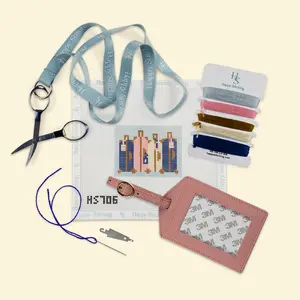 Symphony of Suitcases Luggage Tag Needlepoint Kit - Happy Stitching All-in-One, Self-Finish Needlepoint Kit