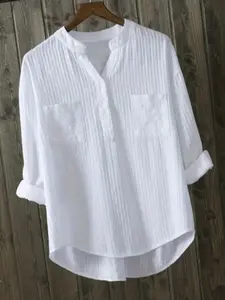 A women's white V-neck relaxed casual design blouse shirt top that is versatile for both work and casual wear