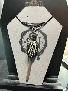 Iron Coffin Nail Necklace with Skeletal Hand Cameo