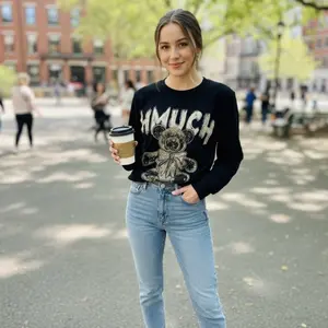 Jessy99-Sweater with rhinestones and a round neckline
