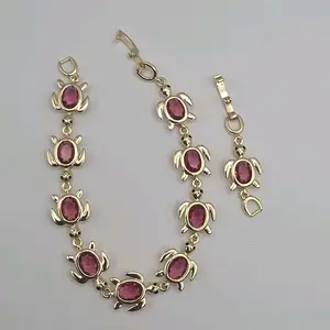 TURTLES FASHION Gold-Plated Pink Fucsia Turtle Bracelet with Adorable Charm Design