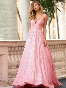 Women's pink sequined spaghetti strap deep V long evening dress, elegant and luxurious style, with a waist-cinching and large hem design, suitable for young women and applicable to important occasions such as dinners and weddings.