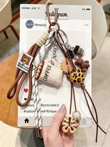 Croissant Bag Charm Realistic Bread + Leopard-Print Heart Design Two-Tone Braided Rope Maillard Color Palette Korean Retro Style Niche And Refined Stylish And Versatile Complex Design For Bags, Keys, And Earphone Cases, Fashion Bag Charms