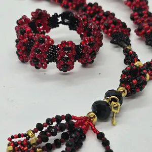 Set Tejido Deluxe orisha Elegua Red Beads with Black Accents and Gold Clasp