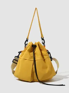 Minimalist Women's Crossbody Bag with Drawstring Design, Commuter Crossbody Bag, Adjustable strap purse, Solid Color Lightweight Bag, Suitable for Commuting, Shopping