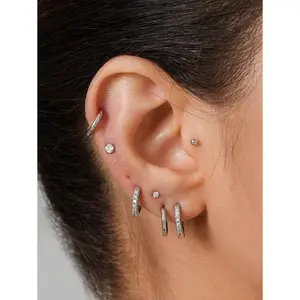 Professional Gold Plated Hoop Earrings Set. 10 Pairs of Dainty Stainless Steel Studs for Effortless Cartilage and Tragus Styling.