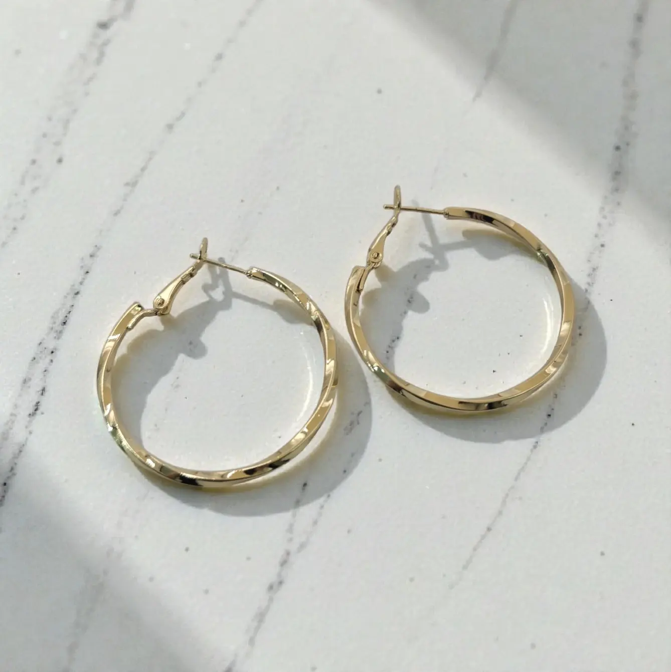 Twisted hoops Twisted hoops