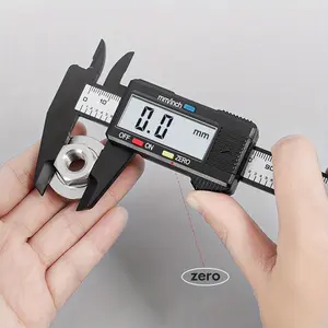 An electronic micrometer measuring tool with an LCD display, using a carbon fiber plastic vernier caliper, Digital Calipers, a battery-powered precision measuring instrument for furniture hardware parts - measuring range up to 150mm
