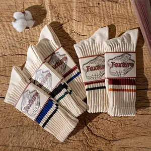 4 Pairs of Men and Women Socks 98% Cotton Crew Socks Featuring a Mix of Striped And Solid Colors, Designed As Long Socks That Are Breathable And Moisture-Wicking. Making Them Ideal for Fitness, Basketball