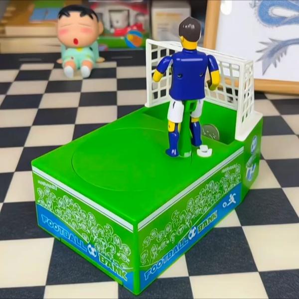 2026 Creative Kicking Soccer Piggy Bank, World Cup Coin Bank, Football-Themed Souvenir Gift, Desktop Decoration, Novel Cartoon Money Bank