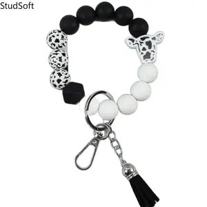 Cow-print silicone beaded wristband/keychain, black and white cow head tassel pendant, cute farmhouse style women's keychain