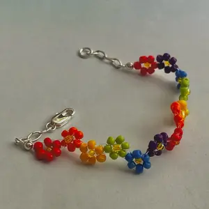 Rainbow Zigzag Flower Bracelet with Silver Accents - Colorful Beads and Vibrant Floral Design