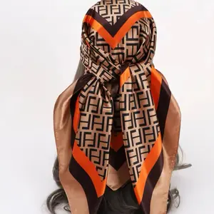 Elegant Orange and Brown Patterned Scarf with Bold Design for Stylish Outfits