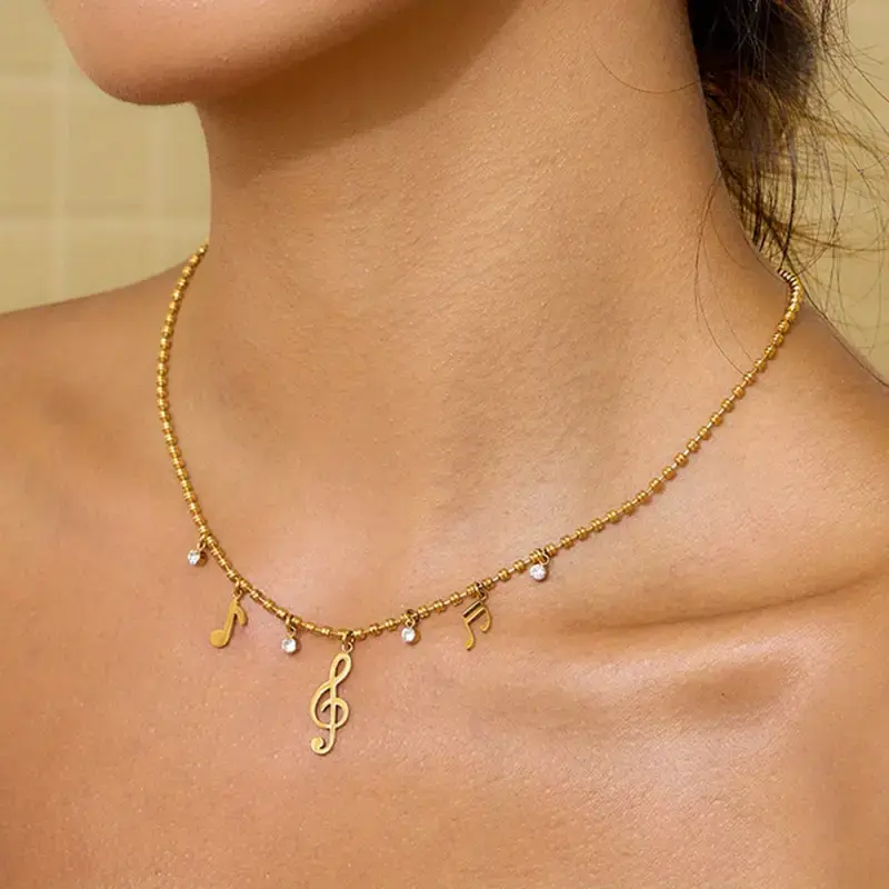 Women's Musical Note Necklace - Minimalist Golden-Toned interlinked music symbols, Delicate chain for Concerts, Parties, Everyday - Elegant Musical Jewelry Gift for Female Musicians & Music Lovers, Party Accessory, Sophisticated Design