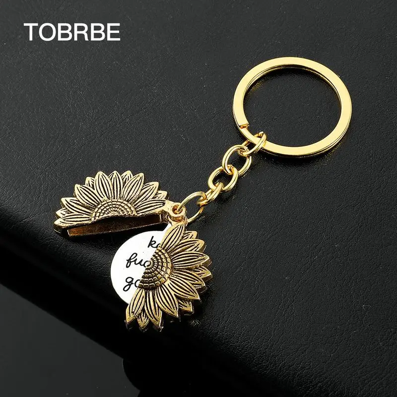 Vintage Unisex Elegant Round Metallic Durable Stainless Steel Sunflower Keychain - Casual Daily Floral Key Ring with Golden-Tone Finish, Motivation Engraved "keep f**king going" Pendant, Personalized Accessory for Keys or Gifting, Inspirational
